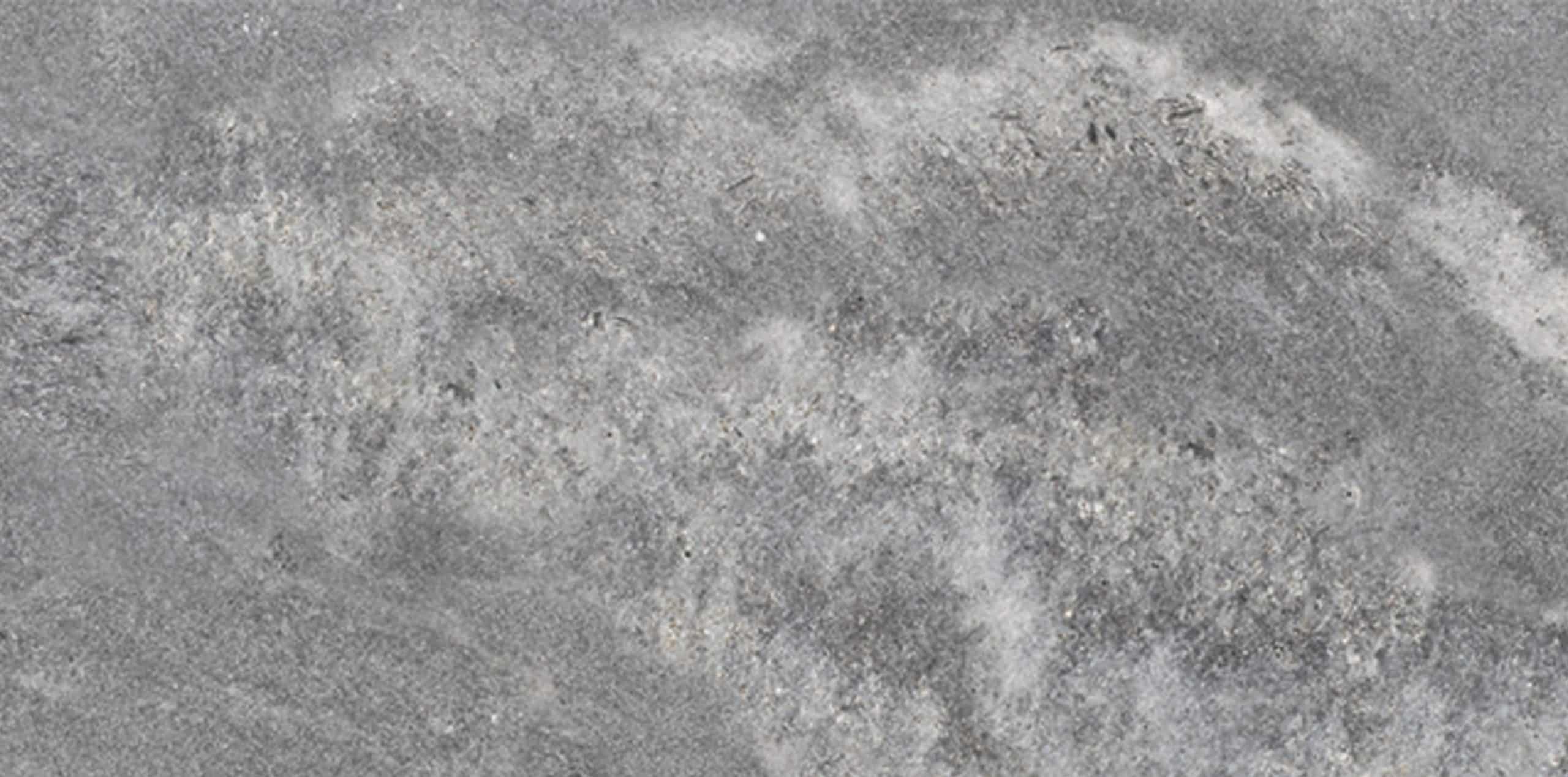 Scirocco - a beautifully textured stone tile with a mix of warm and cool tones.