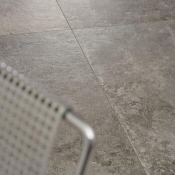 Close-up view of Taurus Grey tile showcasing its elegant texture and color variation.